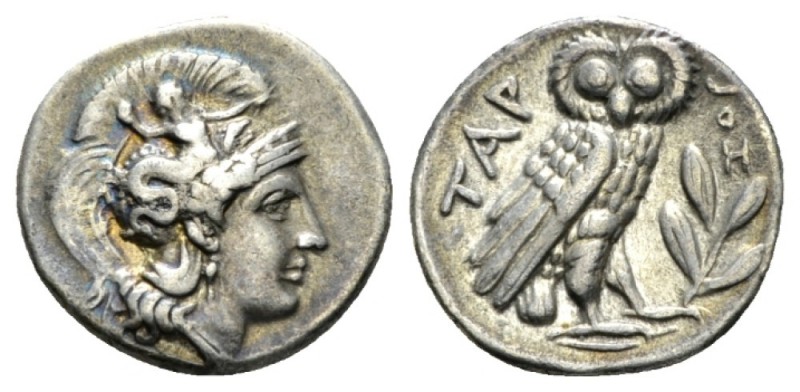 Calabria, Tarentum Drachm circa 302-280, AR 18mm., 3.19g. Head of Athena r., wea...