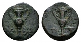 Calabria, Tarentum Bronze circa 275-200, Æ 13.5mm., 1.63g. Cantharus; on each side, star. Rev. Cantharus; at l., TA and at r., bucranium. Vlasto 1821....