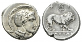 Lucania, Velia Nomos circa 340-330, AR 20.5mm., 7.38g. Head of Athena r., wearing crested Attic helmet decorated with griffin. Rev. Lion standing r.; ...