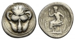 Bruttium, Rhegium Drachm circa 450-445, AR 17.5mm., 4.04g. Facing lion’s head. Rev. Iokastos seated l., holding scepter; all within laurel wreath. Her...