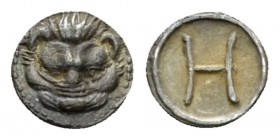 Bruttium, Rhegium Hemilitra circa 415-387, AR 8.5mm., 0.32g. Lion mask. Rev. Large H. Herzfelder pl. XI, K. Historia Numorum Italy 2500.

Old cabine...