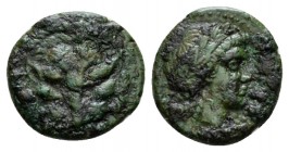 Bruttium, Rhegium Bronze circa 415-390, Æ 15mm., 2.76g. Lion-mask. Rev. Laureate head of Apollo r. Historia Numorum Italy 2525. SNG ANS 697.

Very F...