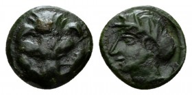 Bruttium, Rhegium Bronze circa 415-387, Æ 11.5mm., 1.38g. Lion-scalp facing. Rev. Laureate head of Apollo l. Historia Numorum Italy 2527. SNG ANS 697....