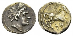 Sicily, Agrigentum (Punic occupation) Quarter Shekel circa 213-211, AR 15.5mm., 1.92g. Wreathed head of Triptolemos r. Rev. Free horse r.; below, Puni...