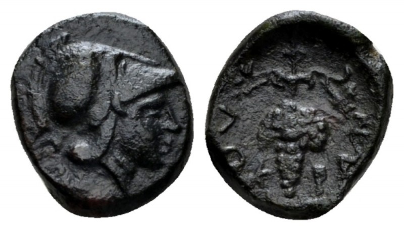 Locri Opuntii, Locri Opuntii Bronze circa 325, Æ 12.5mm., 2.33g. Athena helmeted...