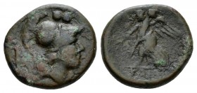 Apulia, Caelia Sextans circa 220-150, Æ 17mm., 5.42g. Head of Athena r., wearing crested Corinthian helmet; above, two pellets. Rev. Nike advancing l....
