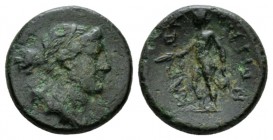 Lucania, Thurium Bronze circa, Æ 18.5mm., 6.06g. Bust of Artemis r., holding quiver over shoulder. Rev. Apollo standing l., holding patera and lyre. S...