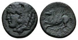 Bruttium, Locri Epizephyrii Bronze circa 300-268, Æ 15.5mm., 3.70g. Head of Herakles l., wearing lion-skin headdress. Rev. Pegasos flying l.; below, h...