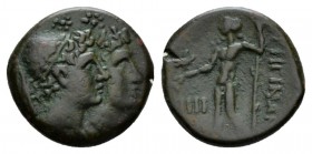 Bruttium, Rhegium Tetras circa 215-150, Æ 15.5mm., 3.11g. Jugate head of Dioskuroi r. Rev. Asklepios standing l. SNG ANS 776. Historia Numorum Italy 2...