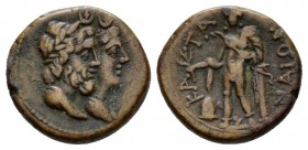 Sicily, Catana Chalkous circa 216-206, Æ 19mm., 5.49g. Jugate busts of Serapis and Isis r. Rev. Apollo standing slightly l., leaning on column, holdin...