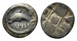 Sicily, Messana as Zankle Litra circa 500-493, AR 11.5mm., 0.69g. Dolphin swimming l within sickle-shaped harbour. Rev. Shell at centre of patterned i...