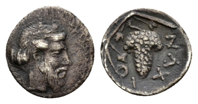 Sicily, Naxos Litra circa 460-430, AR 11.5mm., 0.63g. Bearded head of Dionysos r...