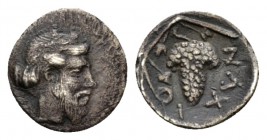 Sicily, Naxos Litra circa 460-430, AR 11.5mm., 0.63g. Bearded head of Dionysos r. Rev. Bunch of grapes. SNG ANS 522. Cahn 84.

Atractive old cabinet...