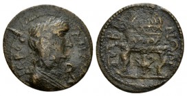 Caria, Tabae Pseudo-autonomous issue. Bronze Late II cent.-Time of Gallienus, Æ 24mm., 6.32g. Laureate bust of youthful Demos r. Rev. Table on which a...
