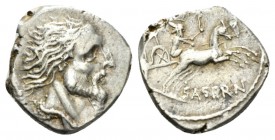 L. Hostilius Saserna. Denarius circa 48, AR 17.5mm., 3.61g. Bearded male head r.; behind, Gallic shield. Rev. L·HOSTILIVS Naked Gallic warrior in fast...