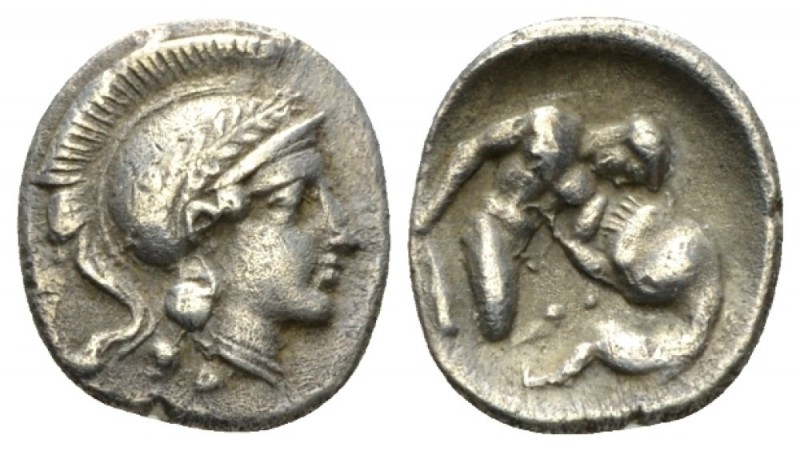 Calabria, Tarentum Diobol circa 325-280,, AR 11.5mm., 1.08g. Helmeted head of At...
