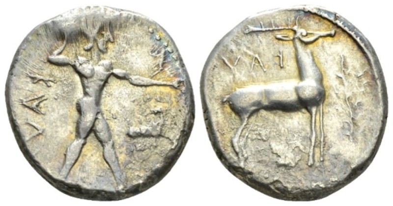 Bruttium, Caulonia Nomos circa 450-445, AR 20mm., 7.72g. Naked Apollo standing r...