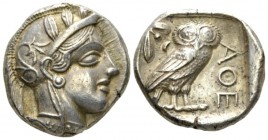 Attica, Athens Tetradrachm after 449, AR 23.5mm., 17.14g. Head of Athena r., wearing crested Attic helmet decorated with three olive leaves and a spir...