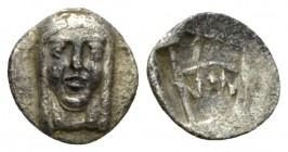 Ionia, Colophon Hemiobol circa 450-410 BC, AR 8.5mm., 0.41g. Facing head of Apollo. Rev. Monogram within incuse rectangle. Milne, Colophon 3.

Toned...