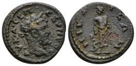 Bithynia, Nicaea Septimius Severus, 193-211 Bronze circa, Æ 18.5mm., 3.23g. Laureate head r. Rev. Asklepius standing facing, head l., holding serpent-...