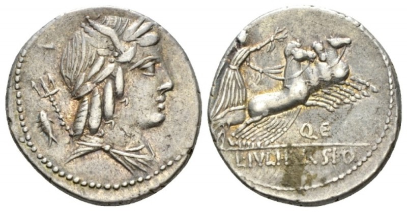 Denarius circa 85, AR 19mm., 3.94g. Male head r., with the attributes of Apollo,...