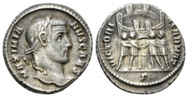Galerius Maximianus Caesar, 293-305 Argenteus circa 295-297, AR 17.5mm., 3.16g. MAXIMIANVS CAES Laureate head r. VIRTVS MILITVM The four Tetrarchs sac...