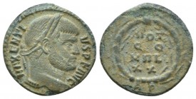 Maxentius, 306-312 Quarter Follis circa 310-312, Æ 16.5mm., 1.48g. Laureate head r. Rev. VOT/QQ/MVL/X within wreath; in exergue AP. RIC VI 238 var.
...