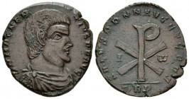 Magnentius, 350-353 Æ1 Treveri circa 352-353, Æ 25.5mm., 8.3g. Bareheaded, draped, and cuirassed bust r. Rev. Christogram; A to left, ω to right; in e...
