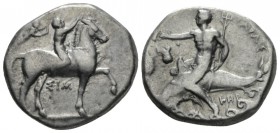 Calabria, Tarentum Nomos circa 350-325, AR 22mm., 7.76g. Horse stepping r. crowned by rider; behind, Nike flying r. to crown the rider; between horse ...