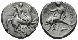 Calabria, Tarentum Nomos circa 325-281, AR 19.5mm., 7.83g. Warrior, preparing to cast spear held in r. hand, holding two spears and shield in l., on h...