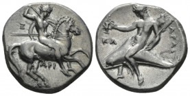 Calabria, Tarentum Nomos circa 325-281, AR 20mm., 7.65g. Naked ephebos on prancing horse r., holding in l. hand, reins, shield and two spears and stri...