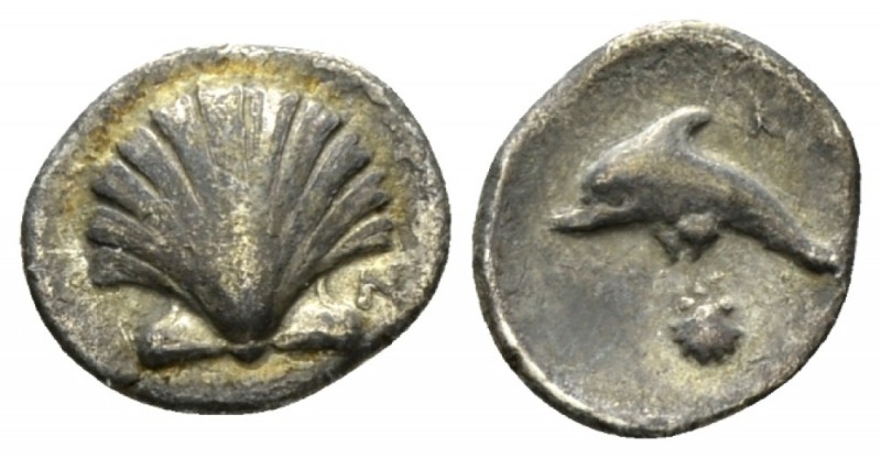 Calabria, Tarentum Litra circa 325-280, AR 11mm., 0.68g. Cockle shell. Rev. Dolp...