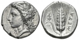 Lucania, Metapontum Nomos circa 330-290, AR 21mm., 7.89g. Wreathed head of Demeter l. Rev. Barley ear with leaf to l.; Artemis-Hekate carrying long to...