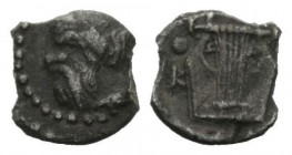 Sicily, Catana Tetras circa, AR 7mm., 0.10g. Bearded head of Satyr l. Rev. Lyre; aroud, three pellets. SNG ANS Ð. Boheringer Proceedings of the 9th In...