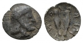 Sicily, Himera Obol circa 472-409, AR 9.5mm., 0.28g. Bearded and helmeted head r. Rev. Pair of greaves. SNG ANS 175.

Very Fine/Good Very Fine.

 ...