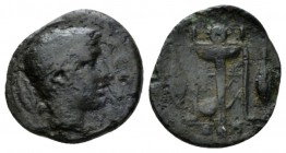 Sicily, Leontini Tetras circa 405-402, Æ 14.5mm., 1.76g. ΛEON Laureate head of Apollo r.; at l. laurel leaf. Rev. Tripod; behind lyre; at side two gra...