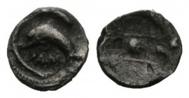 Sicily, Messana as Zankle Hemitartemorion circa 500-493, AR 5.5mm., 0.11g. Dolphin swimming left within crescent harbour. Rev. Nine-part incuse square...