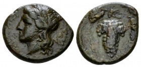 Sicily, Tauromenium Hexas circa 345-338, Æ 16mm., 2.50g. Laureate head of Apollo l. Rev. Bunch of grapes; above, vine. Calciati 12. Campana 13.

Rar...