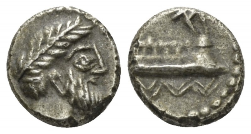 Phoenicia, Aradus Obol circa 400-350, AR 10mm., 1.03g. Laureate and bearded head...