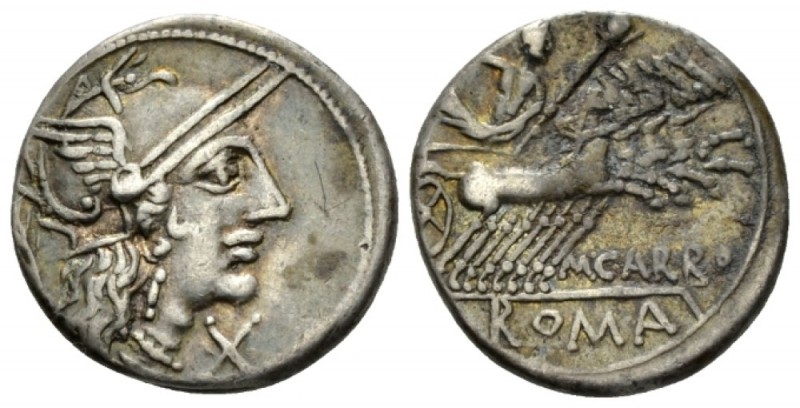 M. Papirius Carbo. Denarius circa 122, AR 18mm., 3.90g. Helmeted head of Roma r....