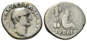 Vespasian, 69-79 Denarius Tarraco (?) circa 70, AR 17.5mm., 3.12g. Laureate head r. Rev. Judaea in mournful attitude seated r. on ground ; behind, tro...