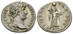 Hadrian, 117-138 Denarius circa 134-138, AR 18mm., 3.27g. Laureate bust r. Rev. Liberalitas standing r., emptying cornucopia. RIC 363. C 917

Old ca...