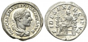 Elagabalus, 218-222 Denarius circa 218-222, AR 20mm., 3.26g. Laureate and draped bust r. Rev. Fides seated l., holding eagle and standard; in front, s...