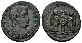 Decentius caesar, 351-353 Æ2 Treveri circa 351, Æ 21.5mm., 4.56g. . Bare-headed and cuirassed bust r. Rev. Two Victories facing each other, holding at...