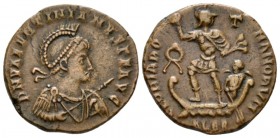 Valentinian II, 375-392 Follis Alexandria circa 383-384, Æ 21.5mm., 5.68g. D N VALENTINIANVS P F AVG Helmeted, pearl-diademed, draped and cuirassed bu...