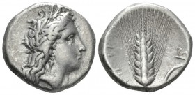 Lucania, Metapontum Nomos circa 330-290, AR 20.5mm., 7.75g. Head of Demeter r., wearing barley wreath; below chin, ΔAI . Rev. META Ear of barley with ...