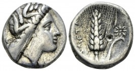 Lucania, Metapontum Nomos circa 330-290, AR 18.5mm., 7.66g. Head of Demeter r., wearing barley wreath; in front EY. Rev. META Ear of barley with leaf ...