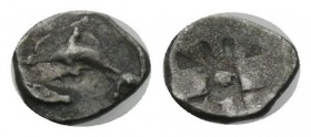 Sicily, Messana as Zankle Tetartemorion circa 500-493, AR 6mm., 0.11g. Dolphin l. within sickle-shaped harbor. Rev. Nine part incuse square with scall...