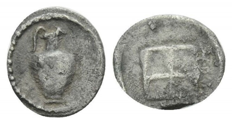 Macedonia, Terone Hemiobol circa V century B, AR 7mm., 0.23g. Oinochoe with bunc...