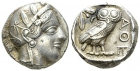Attica, Athens Tetradrachm after 449, AR 23.5mm., 17.16g. Head of Athena r., wearing crested Attic helmet decorated with three olive leaves and a spir...
